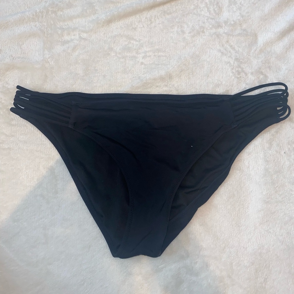 Black Shade & Shore bikini bottoms with details on side